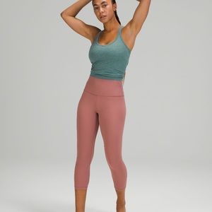 Rose lulu lemon leggings size 2. They are slightly longer than in the picture.